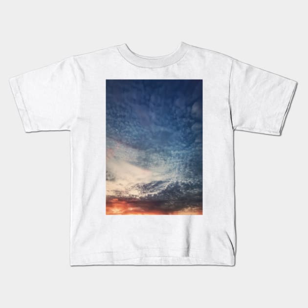 Dreamlike sunset sky Kids T-Shirt by psychoshadow
